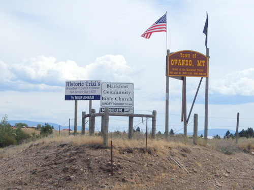 GDMBR: The welcome signs to Ovando (on Hwy 200).